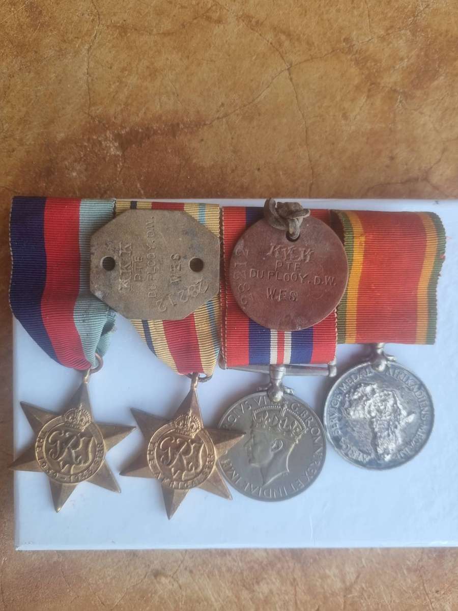WW 2 MEDAL GROUP TO PTE DW DU PLOOY. WITH DOG TAGS.