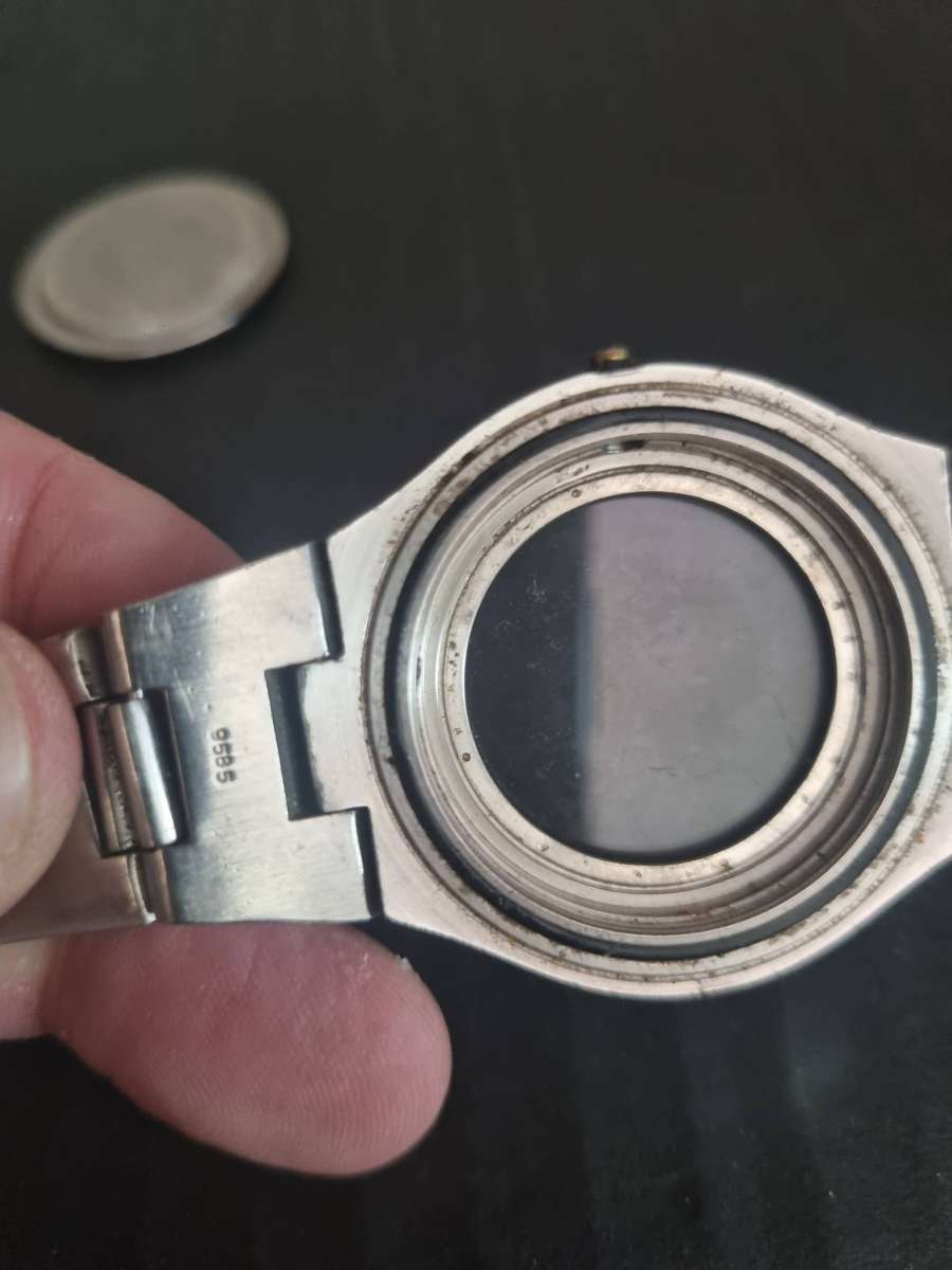 Original Rolex Casing and back plate.  With Tudor watch bezel. Money back guarantee. No Movement.