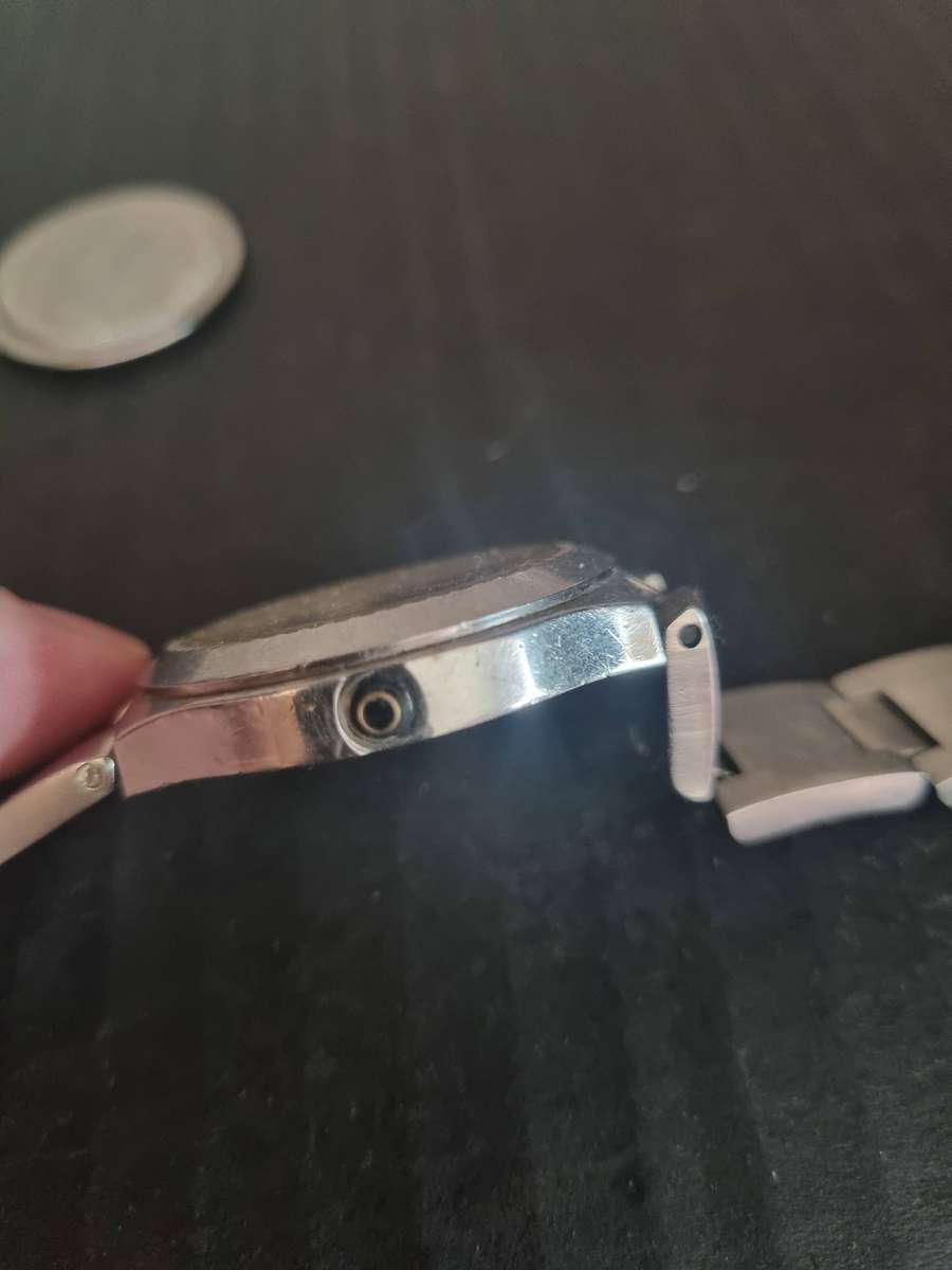 Original Rolex Casing and back plate.  With Tudor watch bezel. Money back guarantee. No Movement.