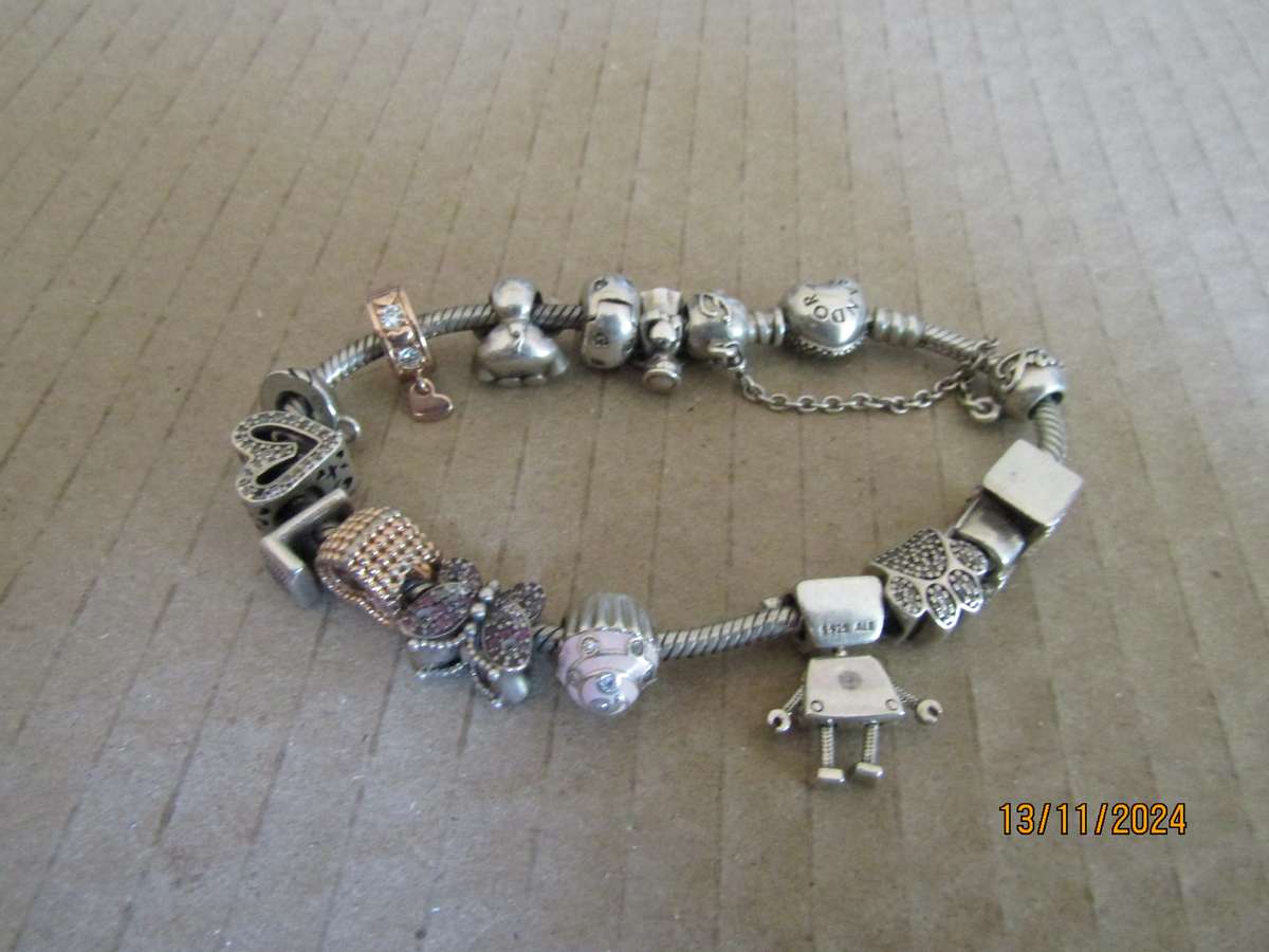 Pandora Bracelet with Silver Charms 56 Grams