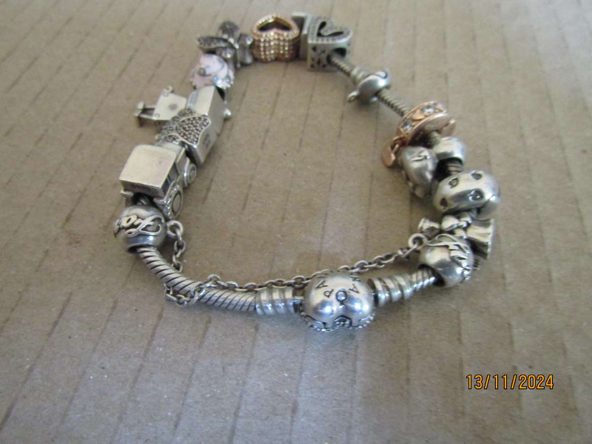 Pandora Bracelet with Silver Charms 56 Grams