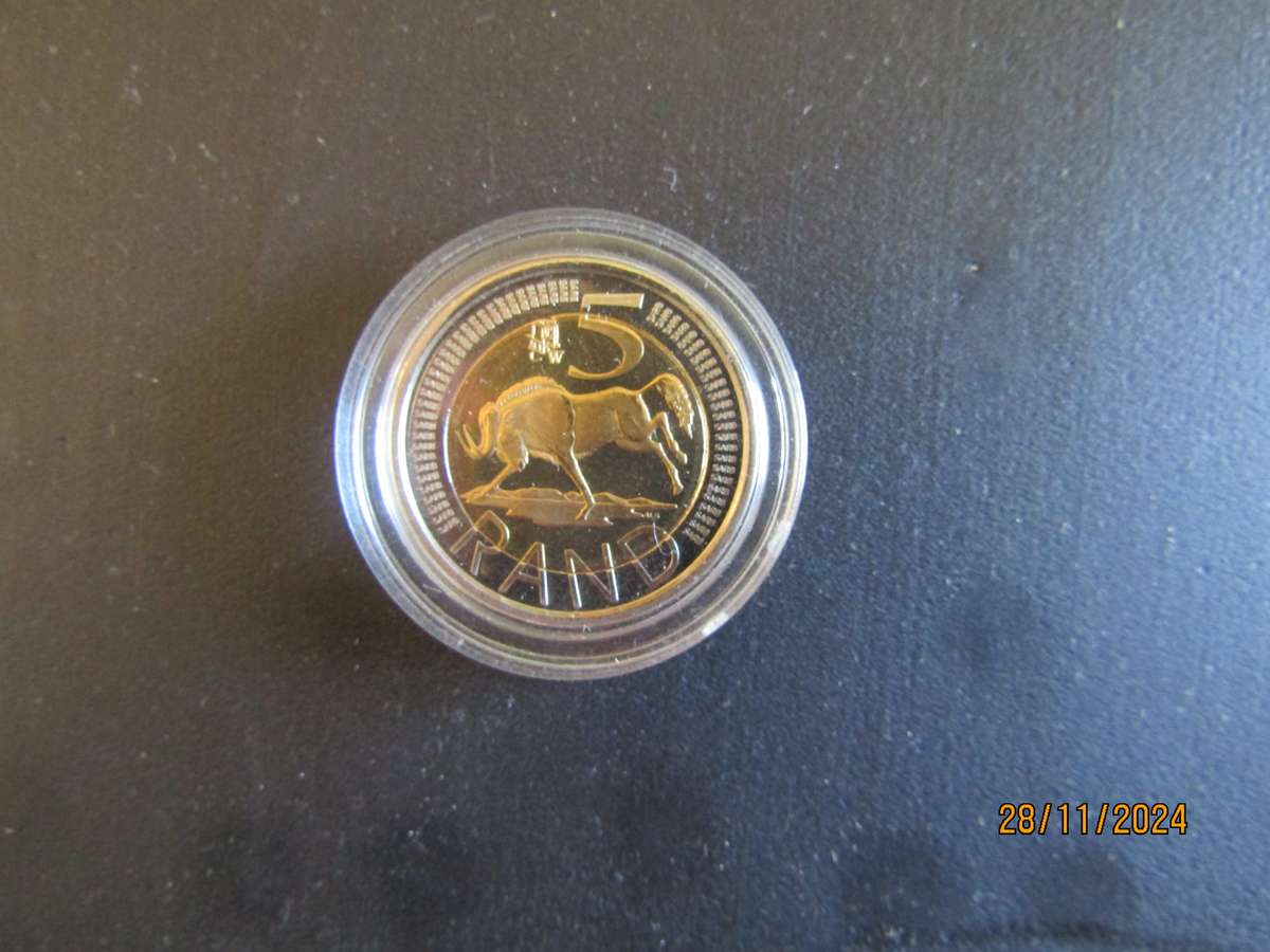 Two 2008 Oom Paul in Capsule. Bid per coin.