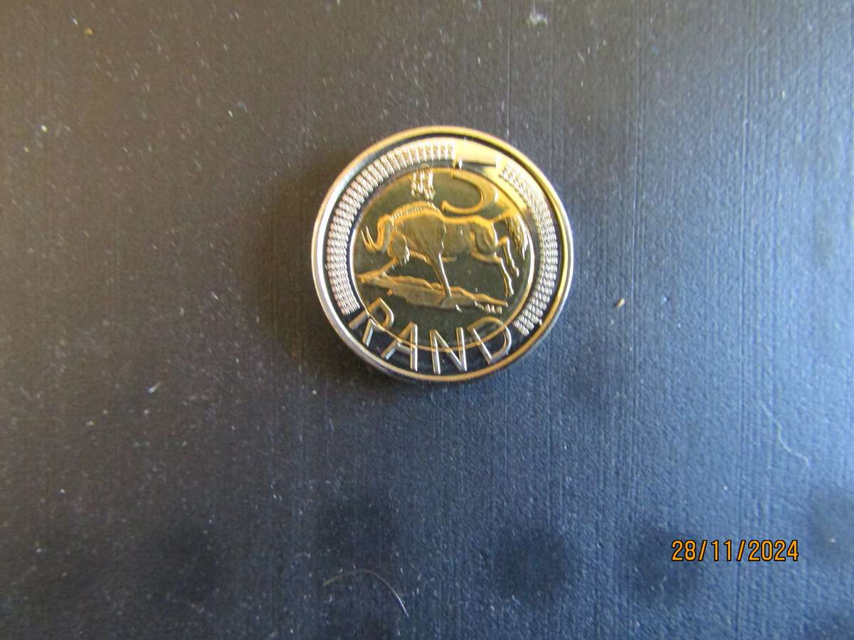 Two 2012 Oom Paul in Capsule. Bid per coin.