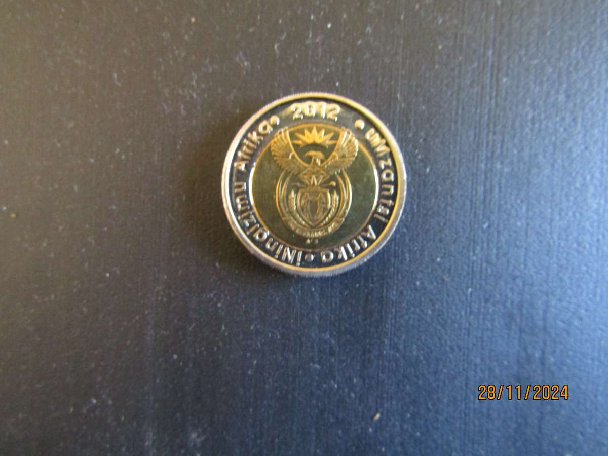 Two 2012 Oom Paul in Capsule. Bid per coin.