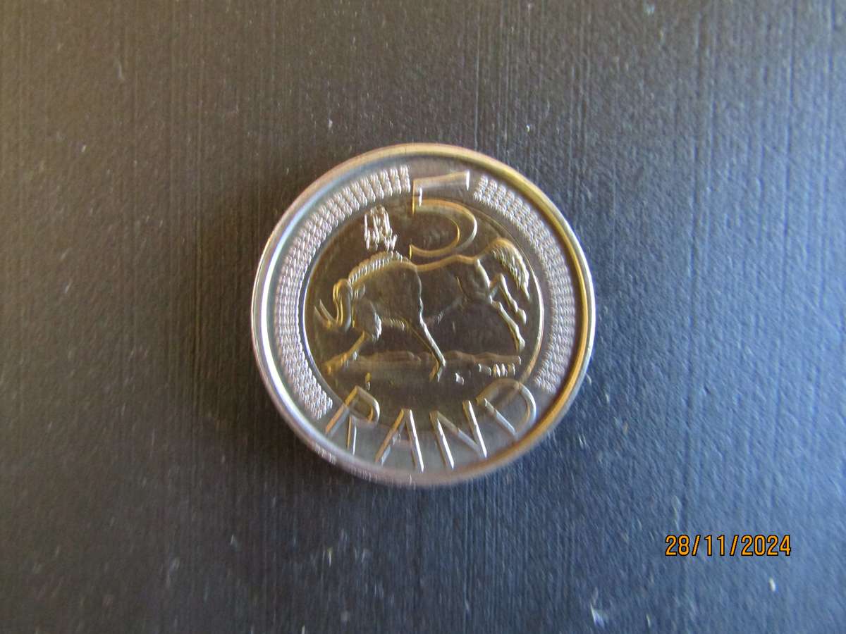 Two 2012 Oom Paul in Capsule. Bid per coin.