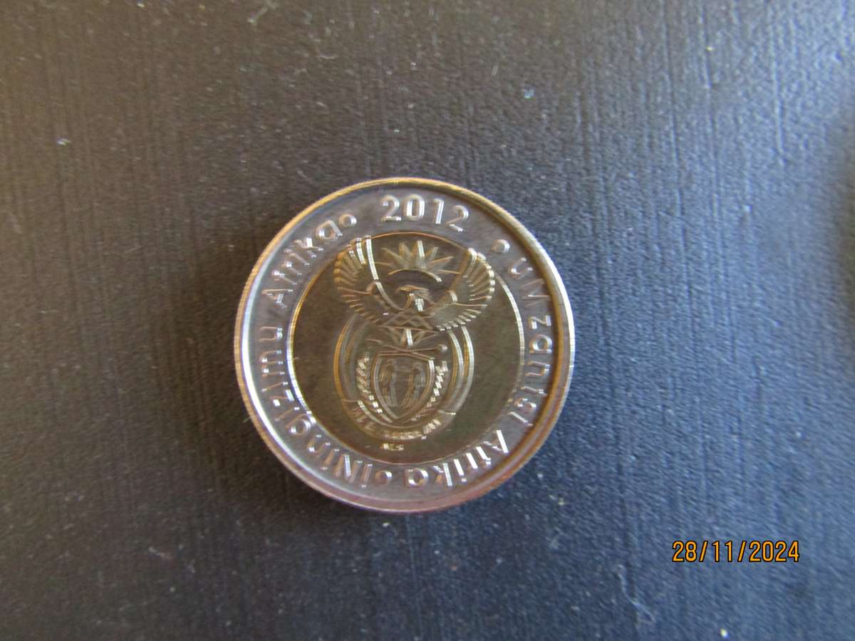 Two 2012 Oom Paul in Capsule. Bid per coin.