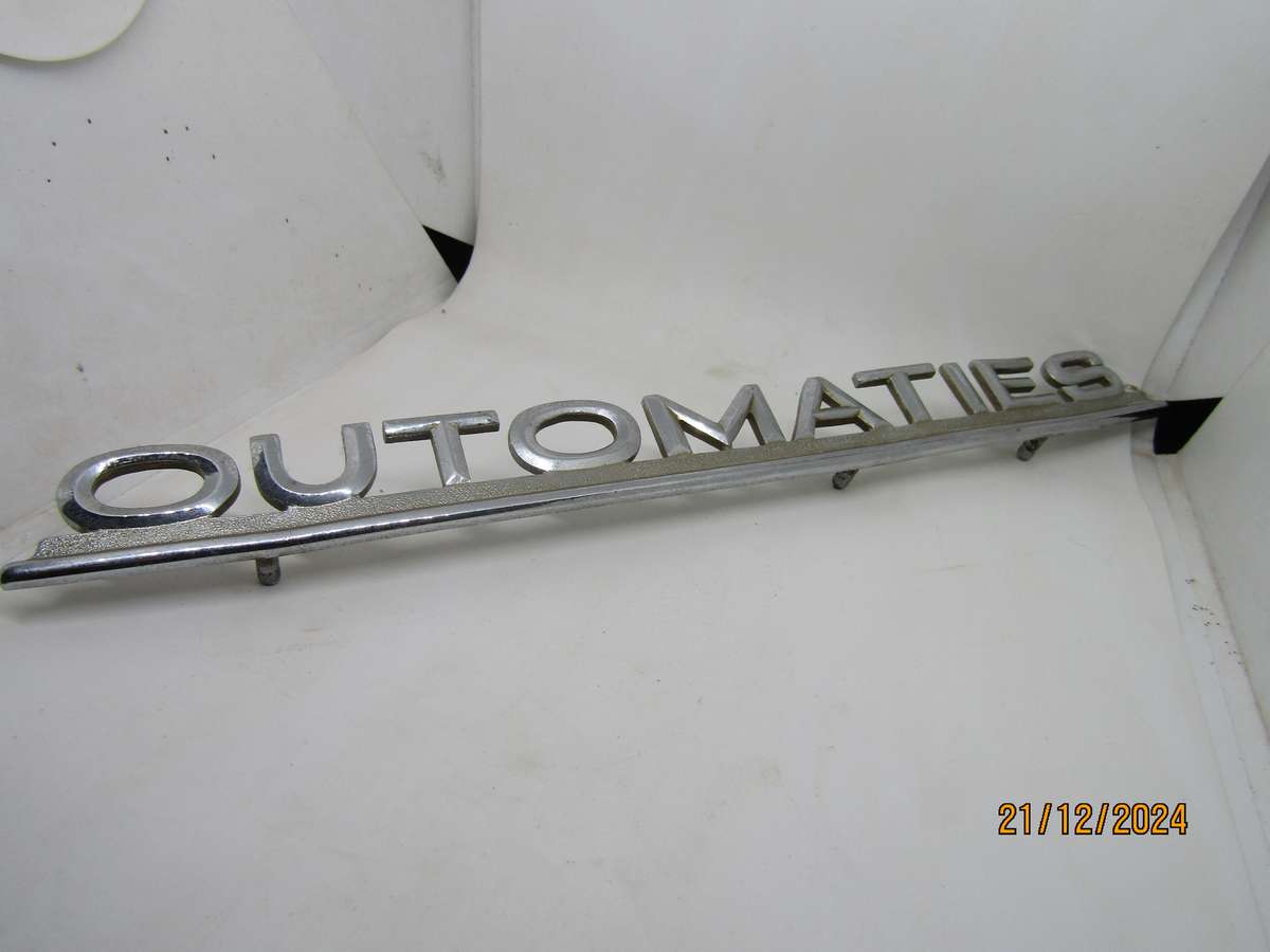 Vintage Ford Fairlane Outomaties Metal Sign. Pins intact. 27CM