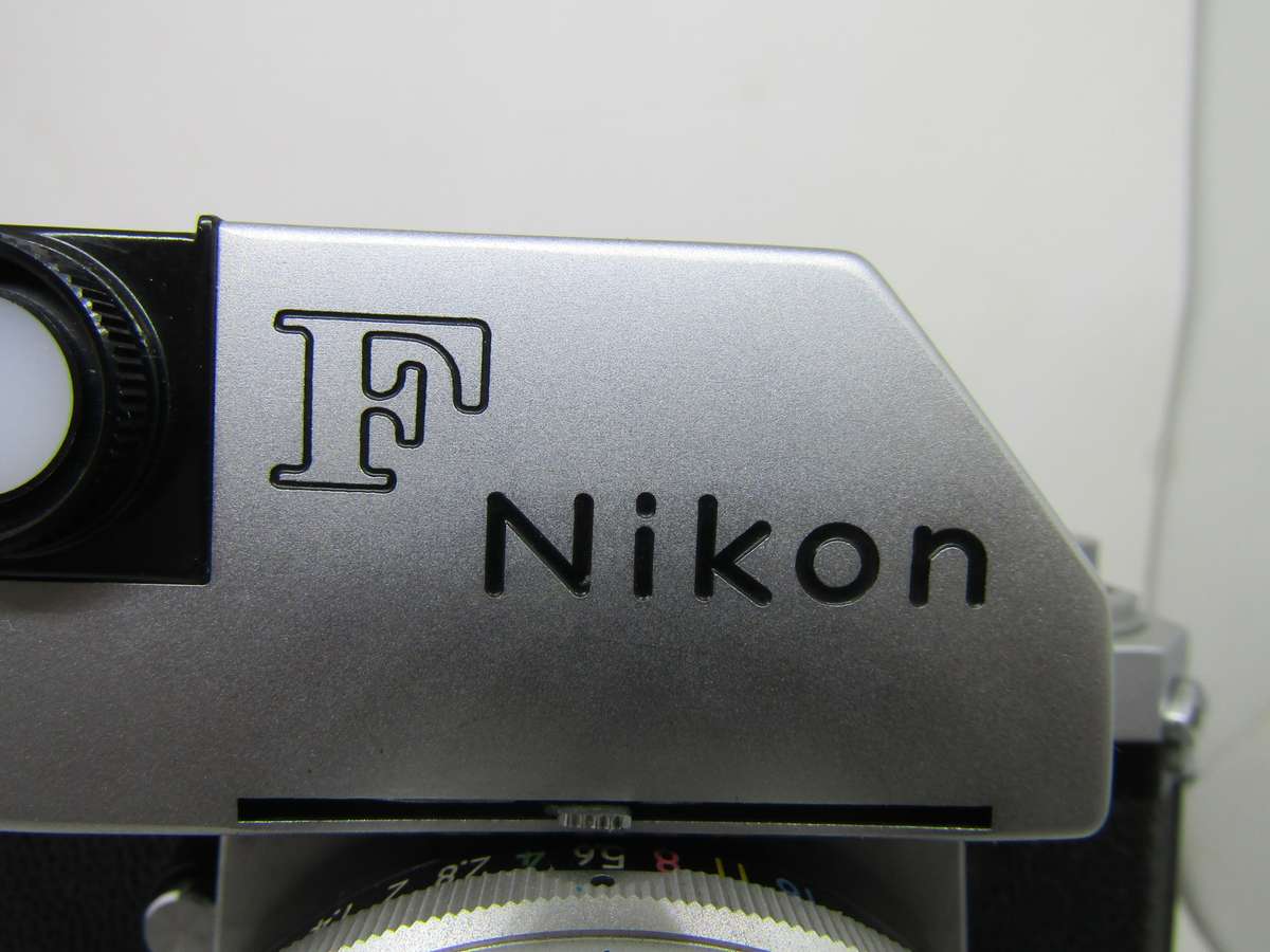 Chrome Nikon F 35mm film slr camera photomic meter nikkor-h 1:2 f50mm kogaku lens. Immaculate. Work