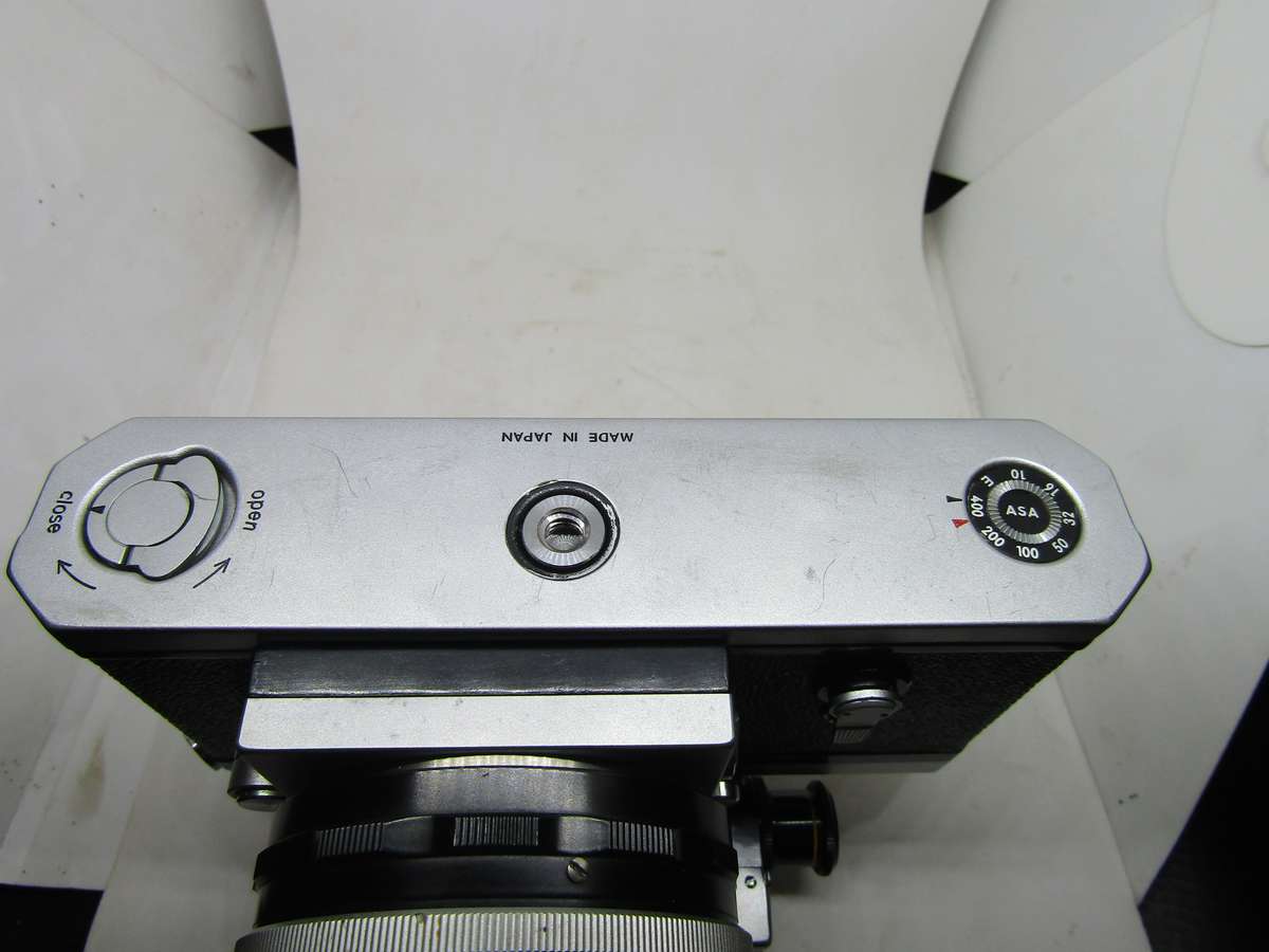 Chrome Nikon F 35mm film slr camera photomic meter nikkor-h 1:2 f50mm kogaku lens. Immaculate. Work