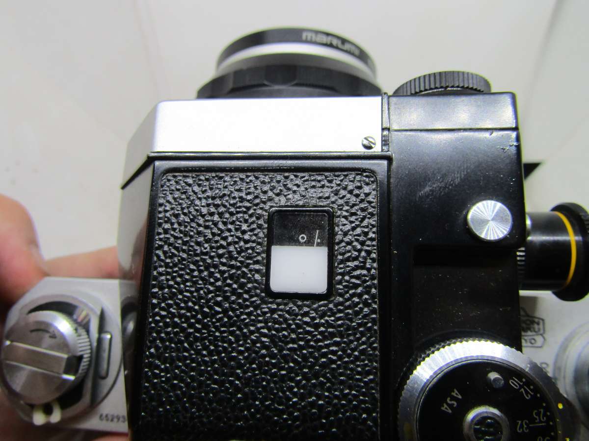 Chrome Nikon F 35mm film slr camera photomic meter nikkor-h 1:2 f50mm kogaku lens. Immaculate. Work