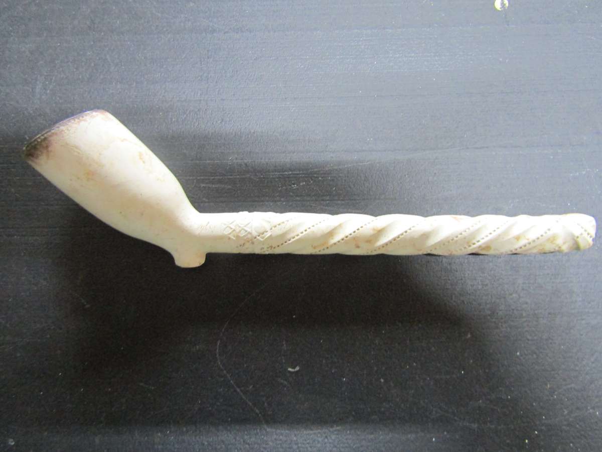 2 1800's Clay Pipe one being Ornate. Not broken or chipped
