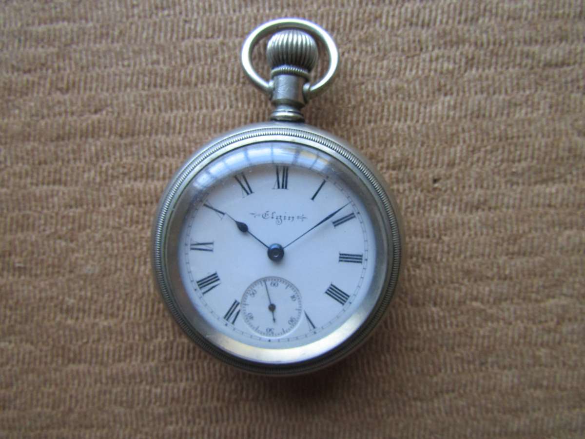 Elgin American Pocket watch. Starts ticking and stops. Need service