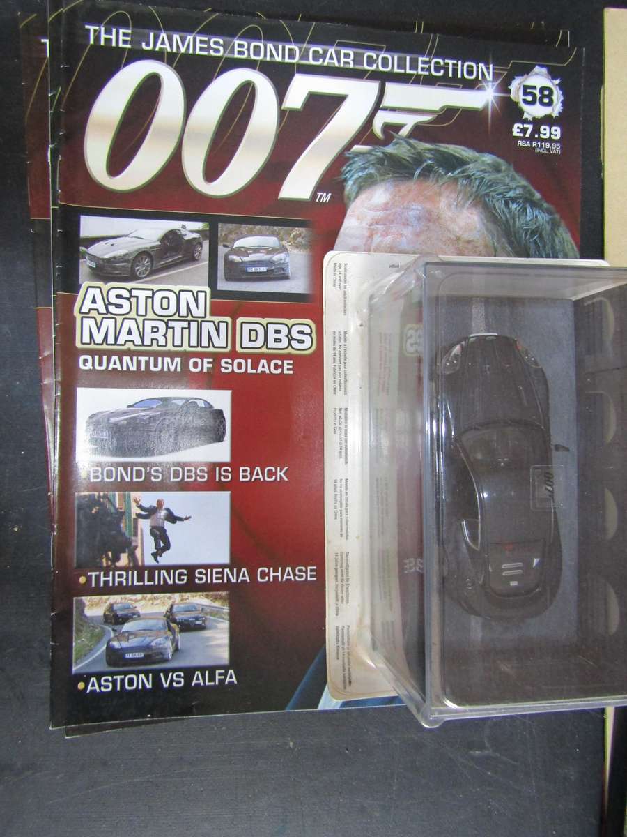 007 Aston Martin DBS - Quantum of Solace - scale 1/43. Sealed. With Book Nr 85