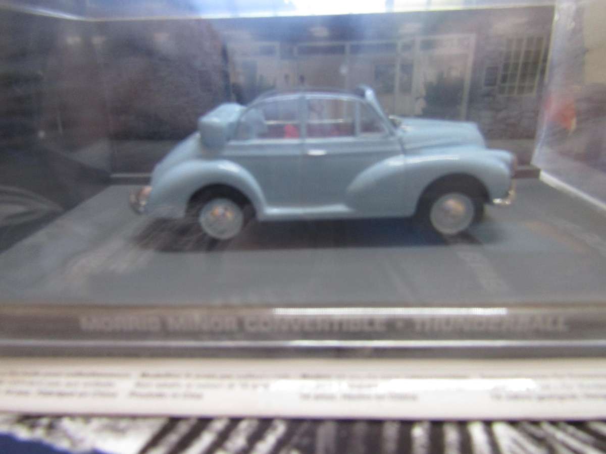 007 Morris Minor Convertible   - Thunderball - scale 1/43. Sealed. With Book Nr 128