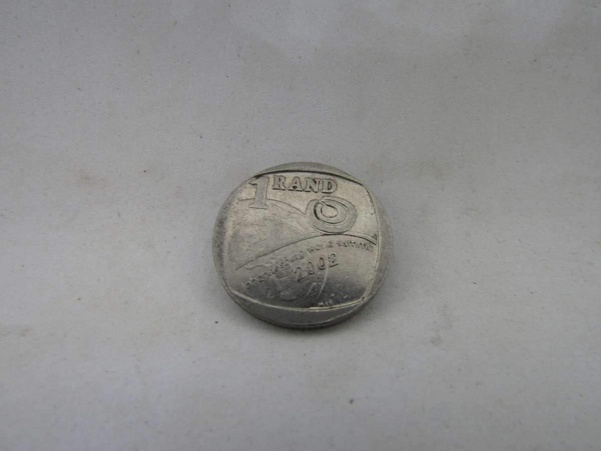 2001 World Summit One Rand coins.
