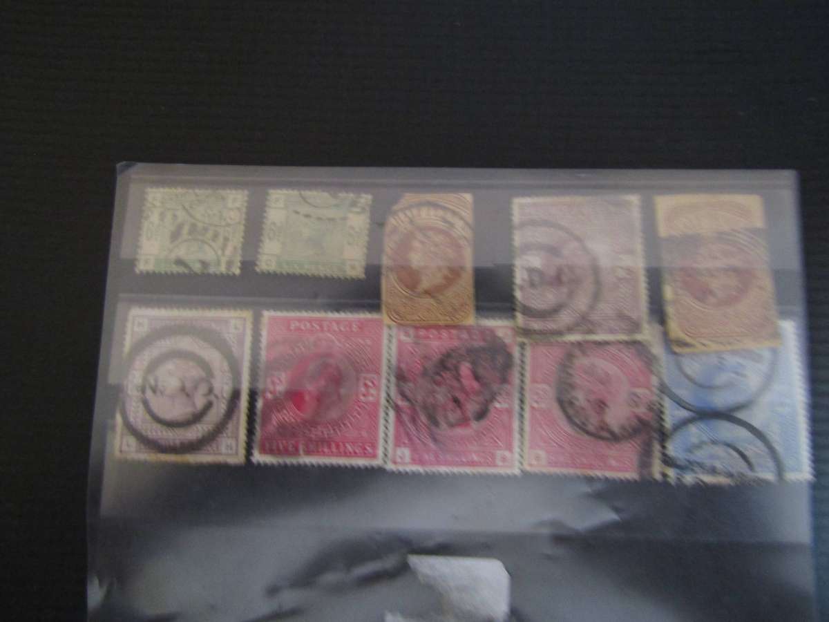 Various pages of Great Britain stamps sets. Hinged