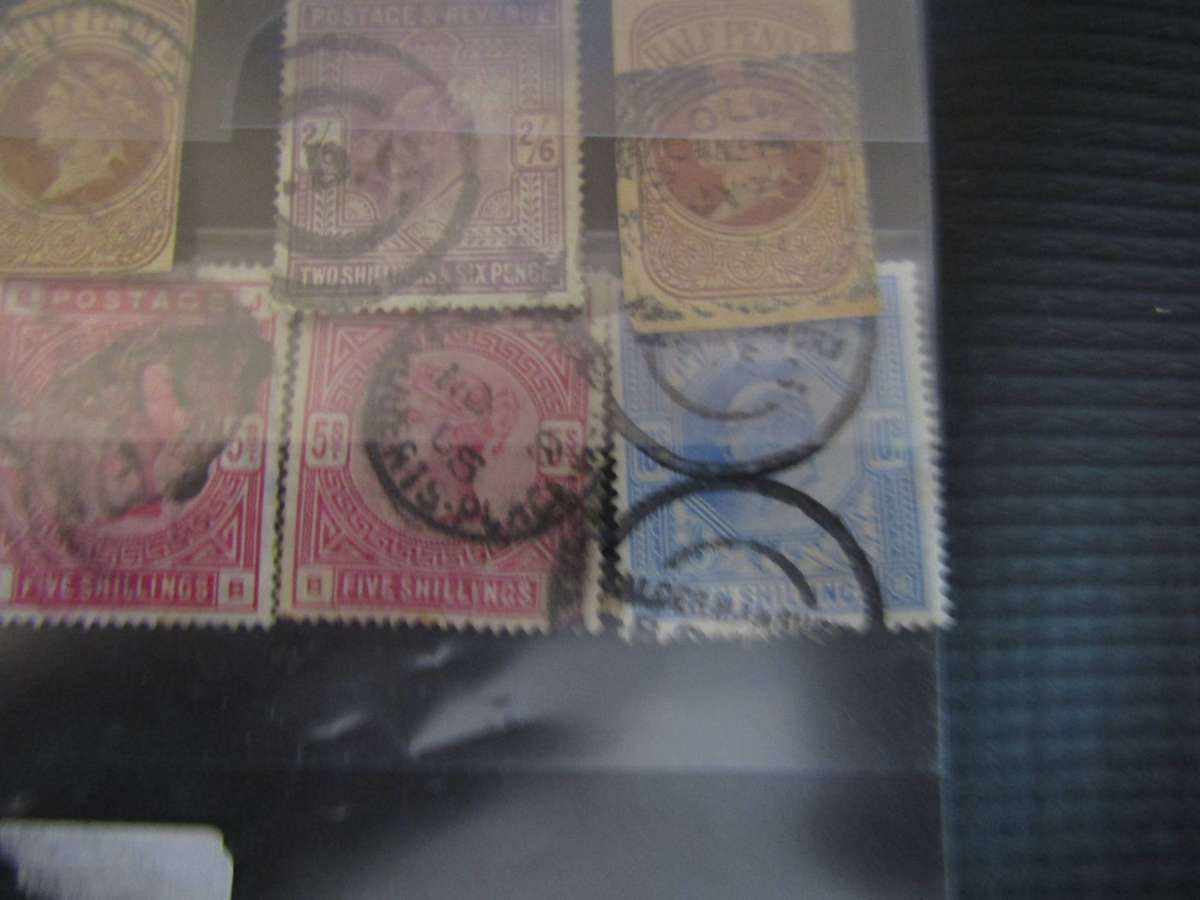 Various pages of Great Britain stamps sets. Hinged