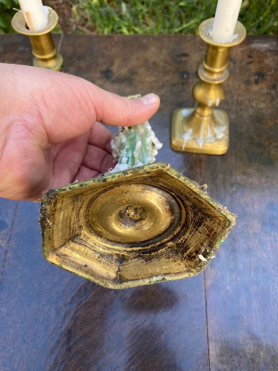 Three brass candle holders