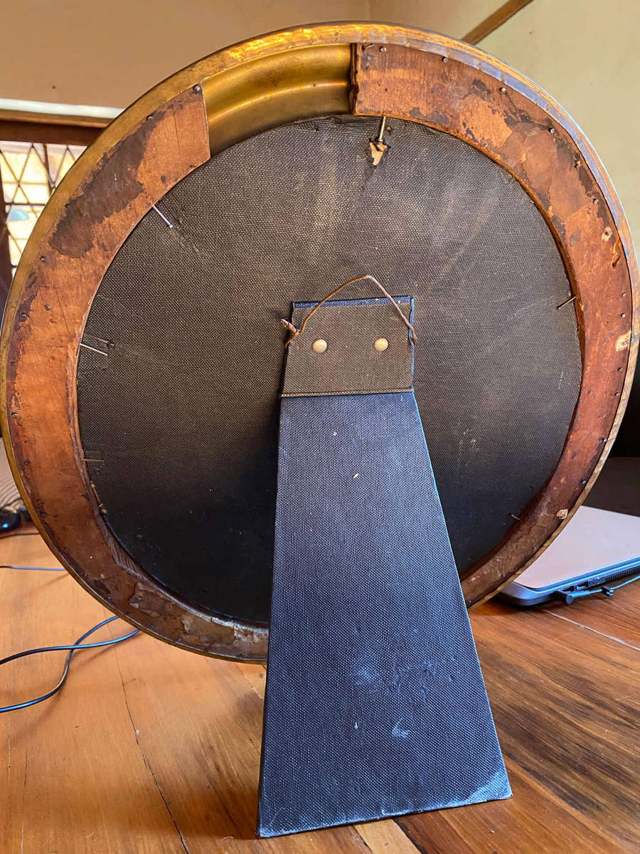 EDWARDIAN OVAL BRASS-FRAMED WALL MIRROR