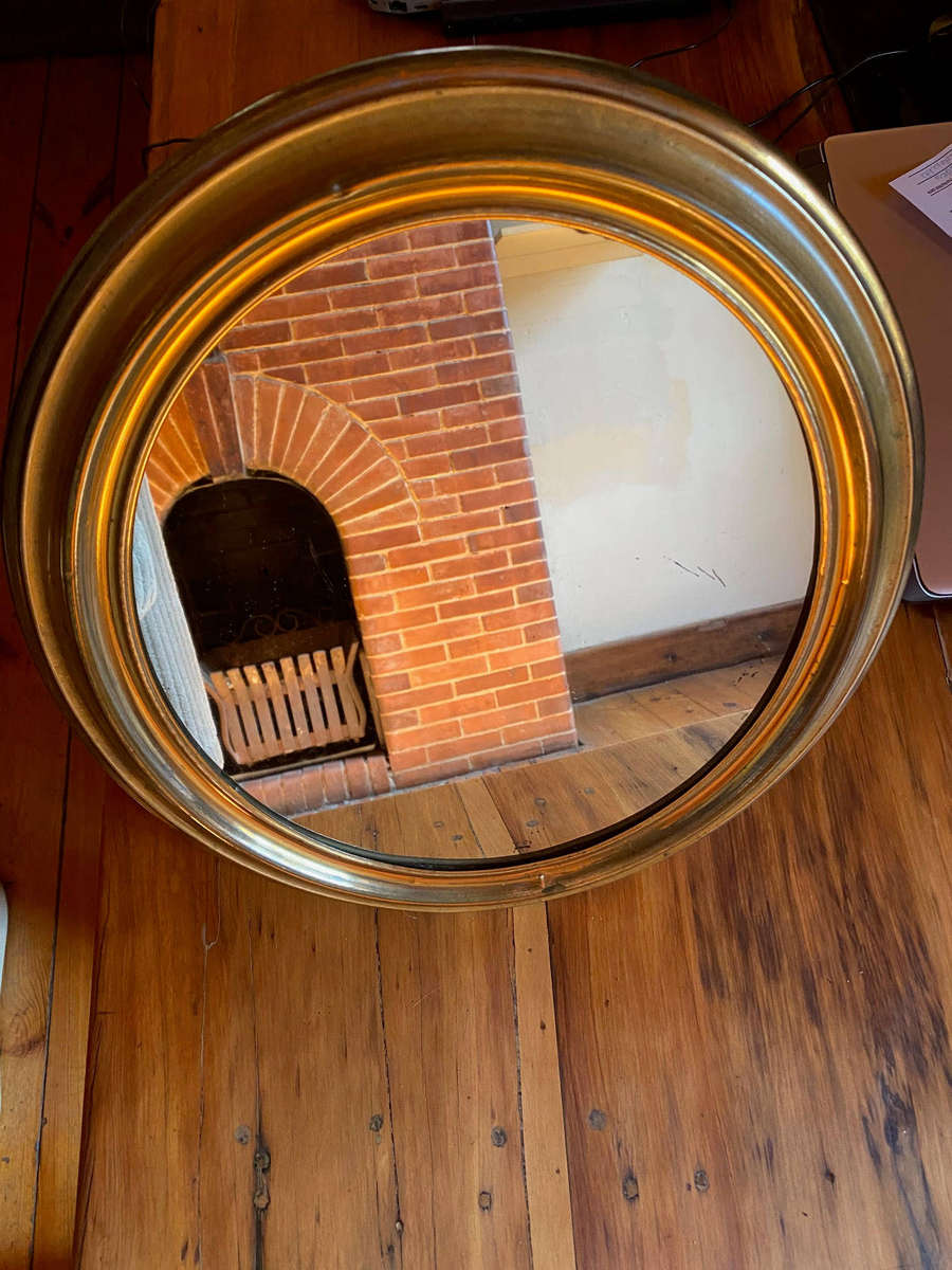 EDWARDIAN OVAL BRASS-FRAMED WALL MIRROR