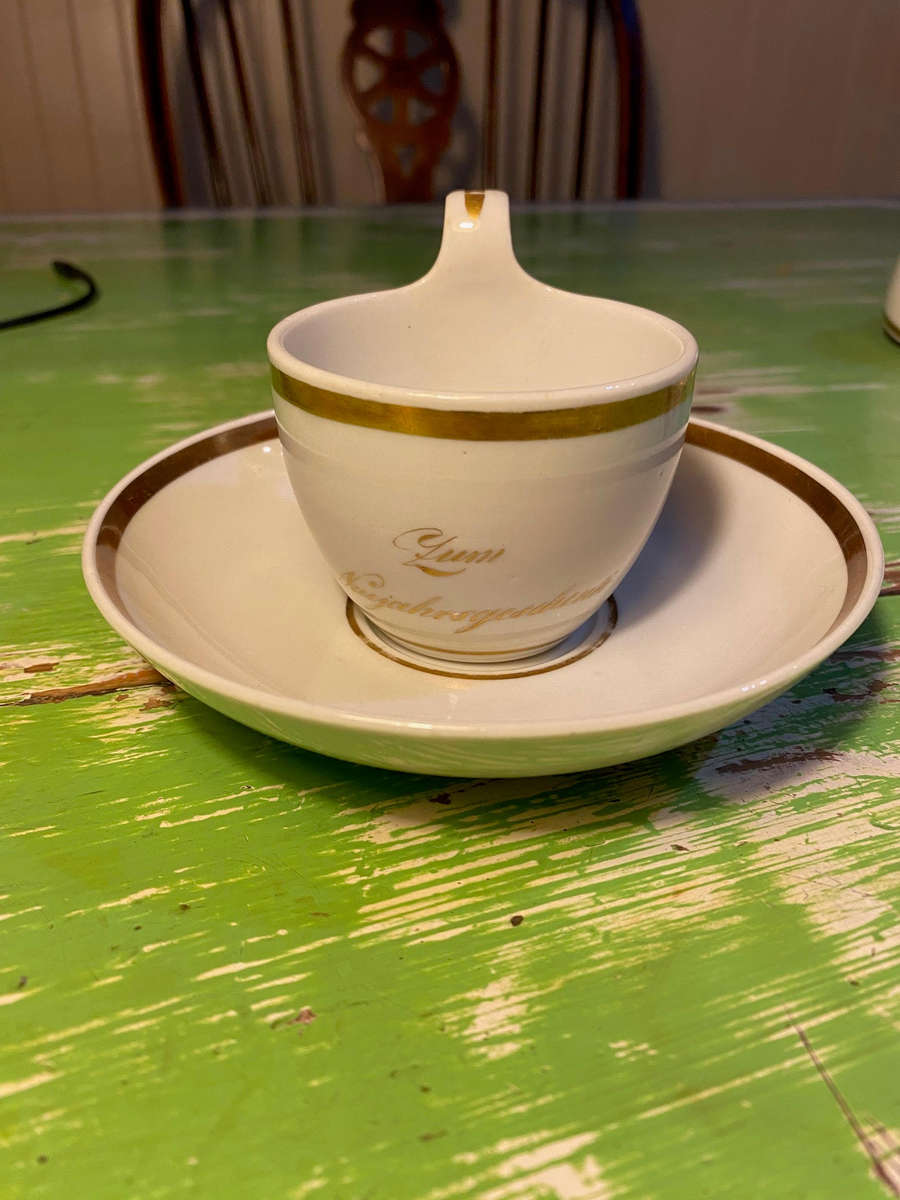 Antique German porcelain cups and saucers