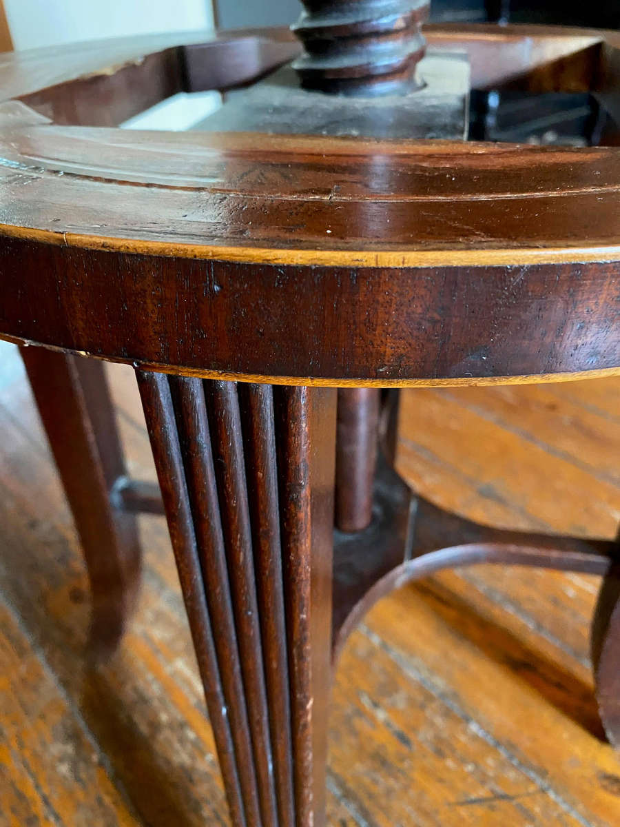 A Victorian mahogany adjustable circular piano stool