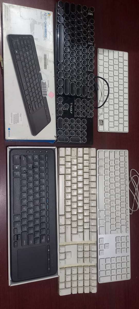 3x Apple Keyboards, 1x Mechanical Keyboard and Microsoft Keyboard with touchpad