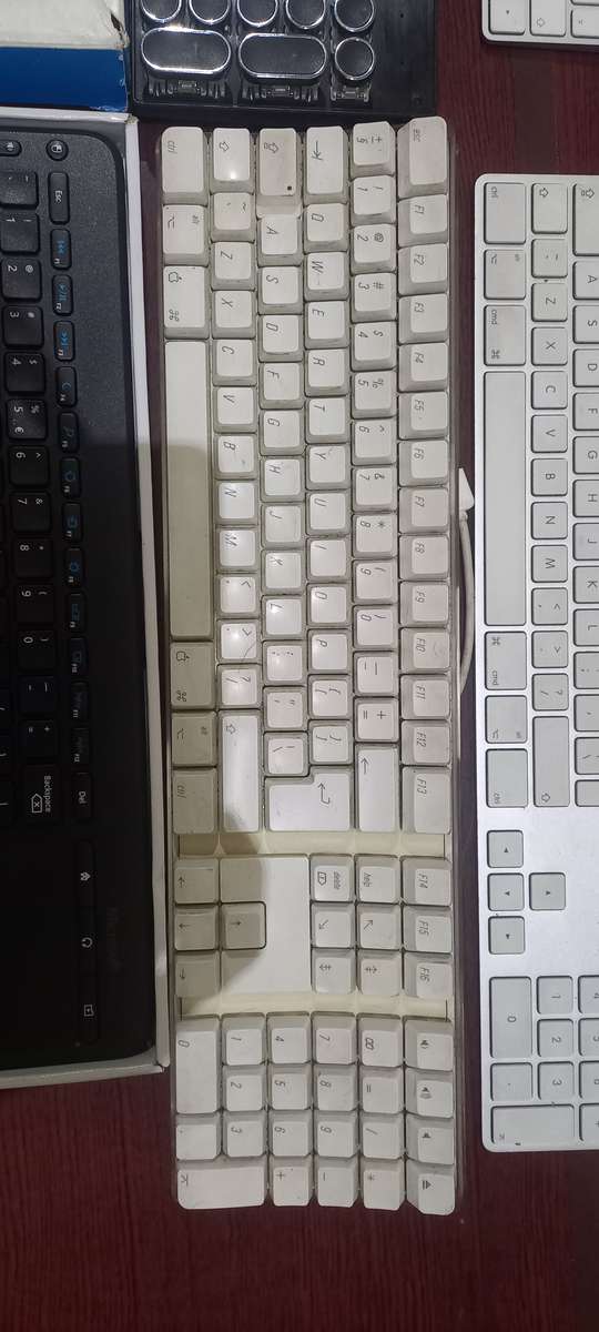 3x Apple Keyboards, 1x Mechanical Keyboard and Microsoft Keyboard with touchpad