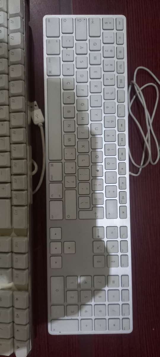 3x Apple Keyboards, 1x Mechanical Keyboard and Microsoft Keyboard with touchpad