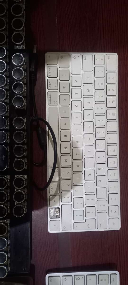 3x Apple Keyboards, 1x Mechanical Keyboard and Microsoft Keyboard with touchpad