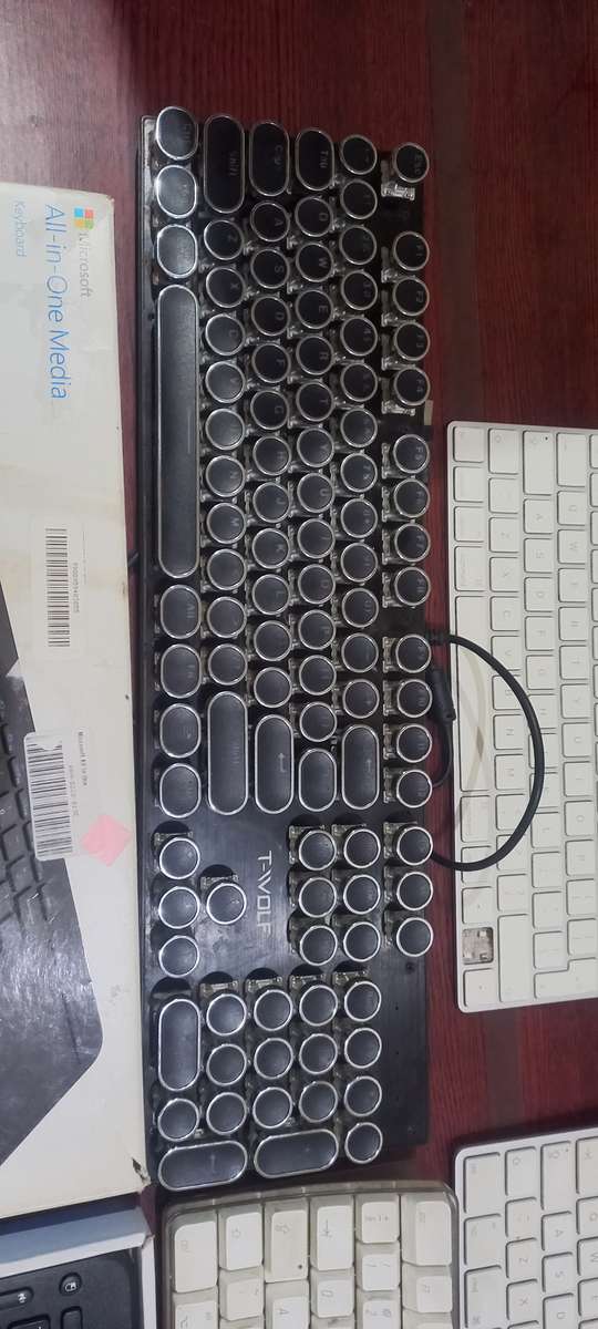 3x Apple Keyboards, 1x Mechanical Keyboard and Microsoft Keyboard with touchpad