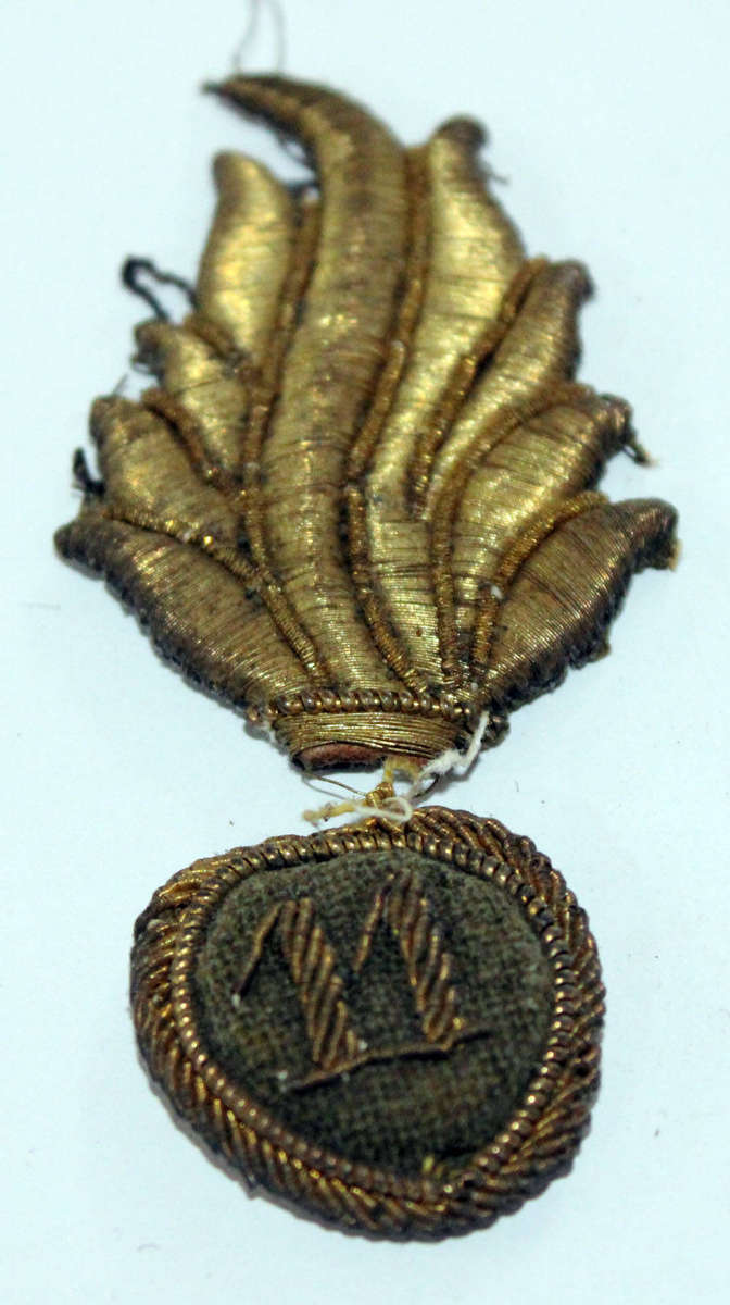 Colonial Italian 11th Grenadiers cloth badge (damaged)