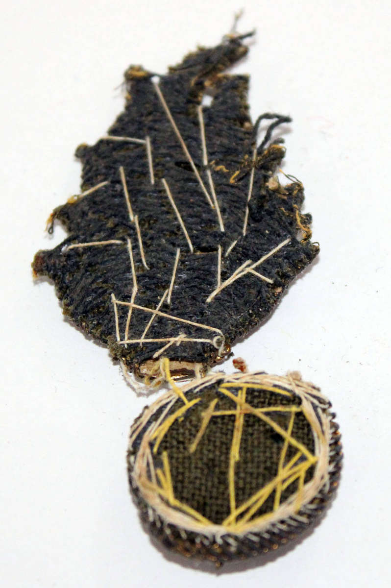 Colonial Italian 11th Grenadiers cloth badge (damaged)