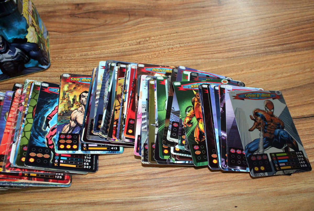 Over 200 Spiderman Heroes and villains cards in tin