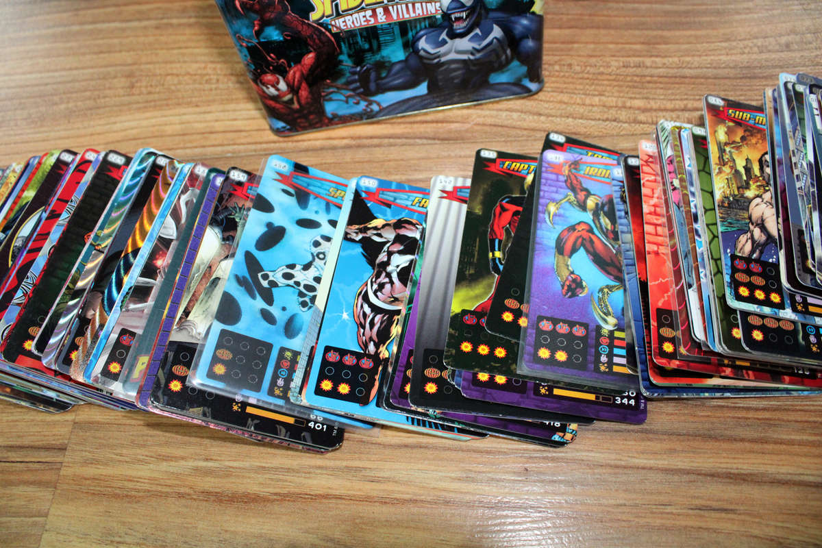 Over 200 Spiderman Heroes and villains cards in tin