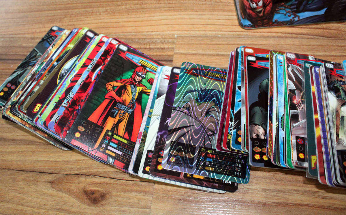 Over 200 Spiderman Heroes and villains cards in tin