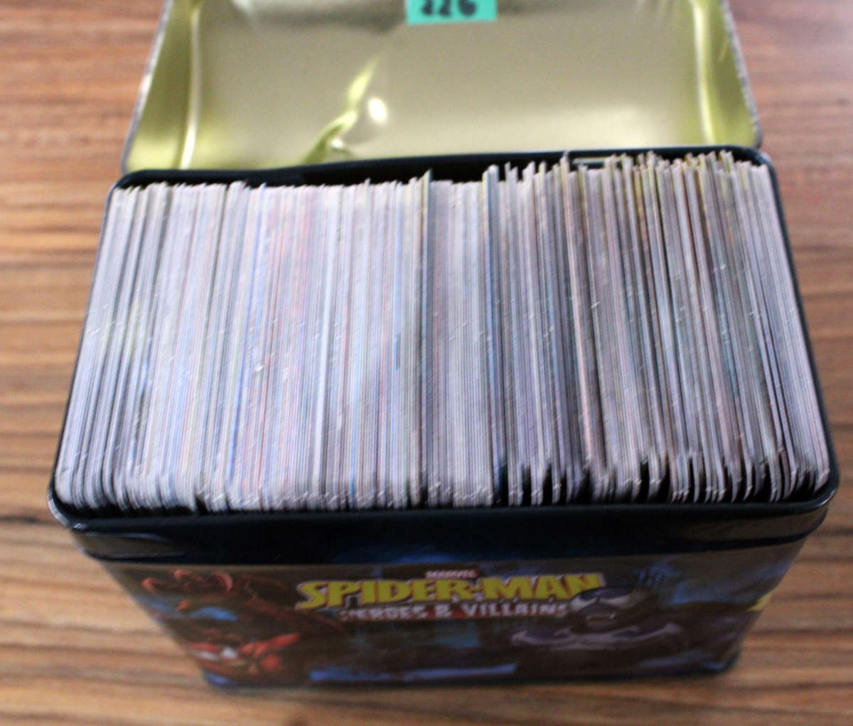 Over 200 Spiderman Heroes and villains cards in tin