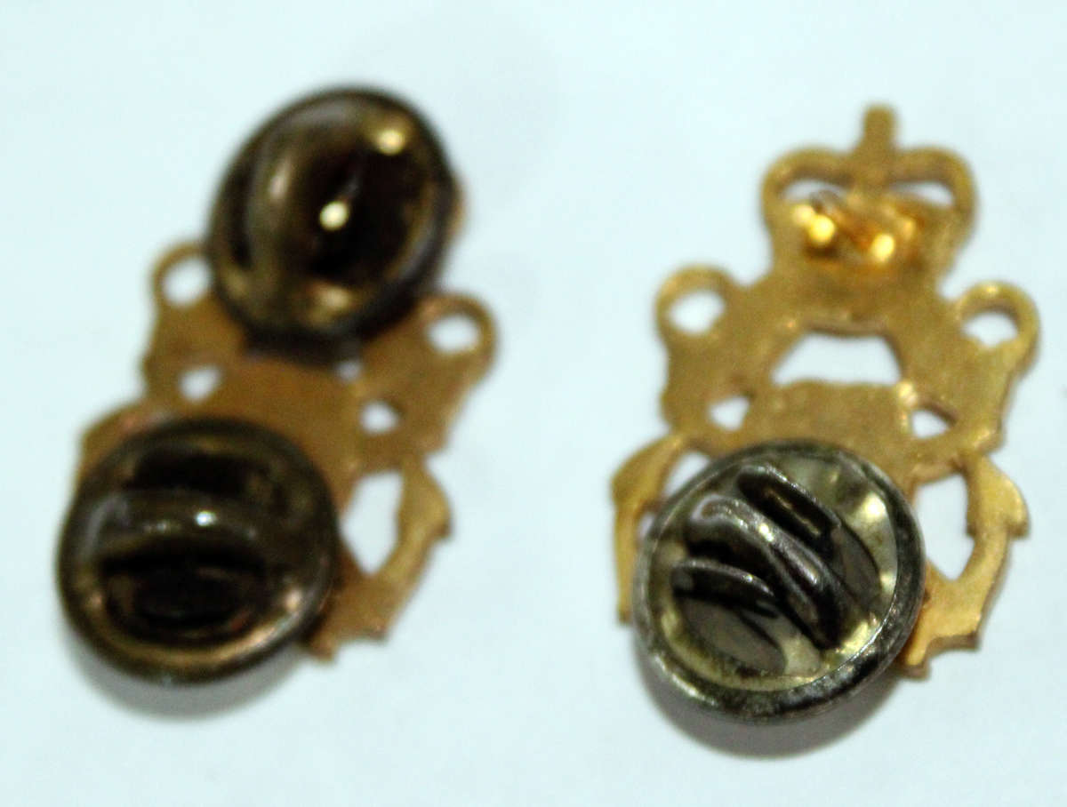 2x Royal Navy badges