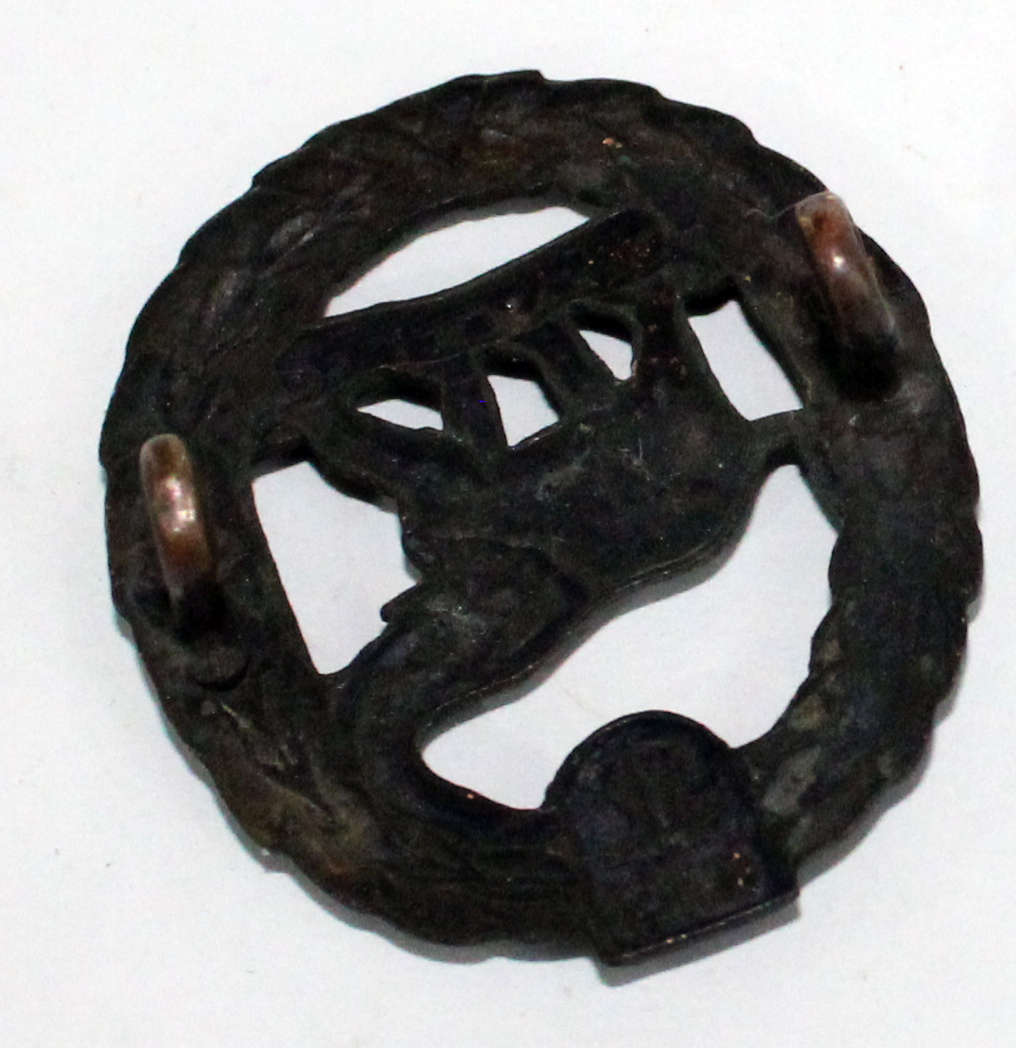 Non-European Army Services collar badge