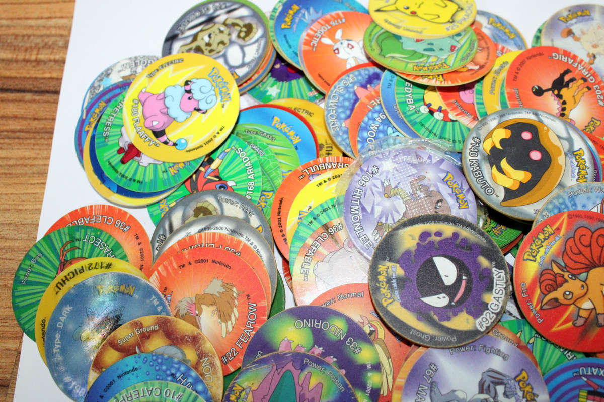 120+ Simba Pokemon Tazos plus storage container