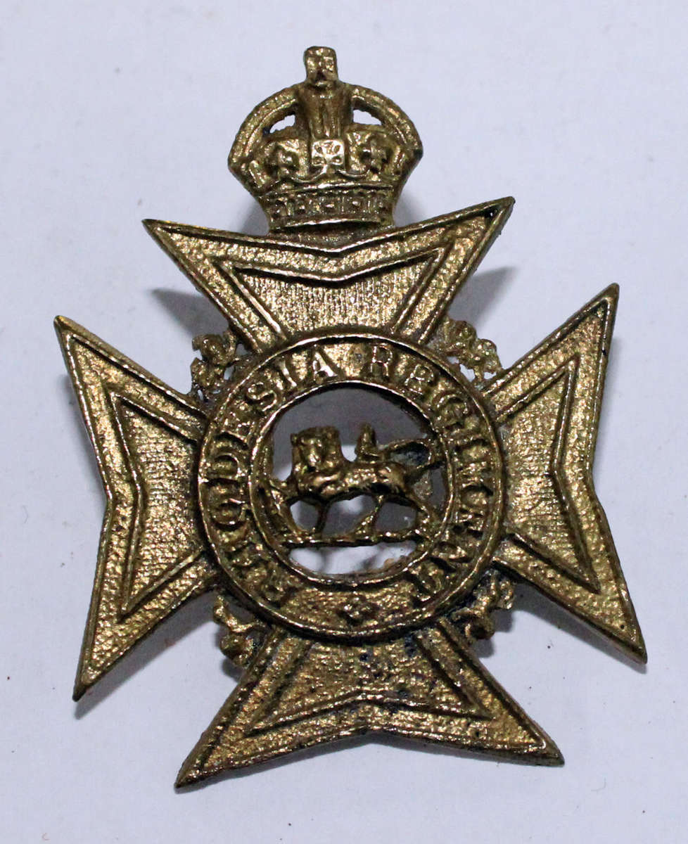 Pre 1947 Rhodesia Regiment cast cap badge