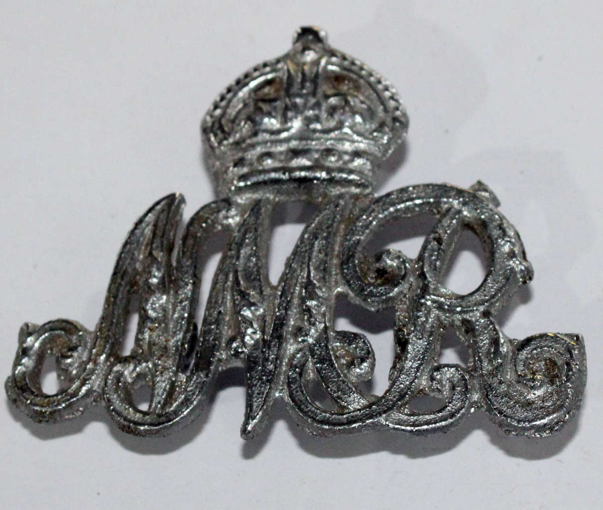 Natal Mounted rifles cast helmet badge