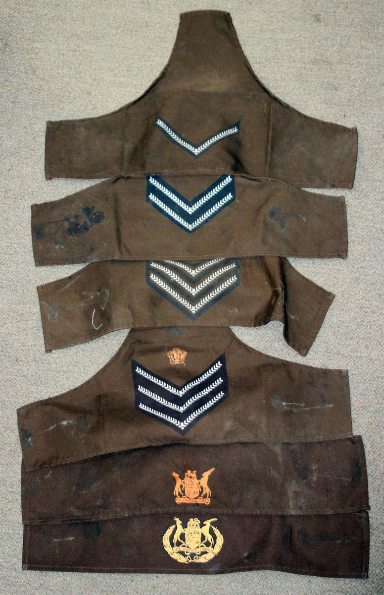 Printed SADF brassards going from Lance corporal to WO1