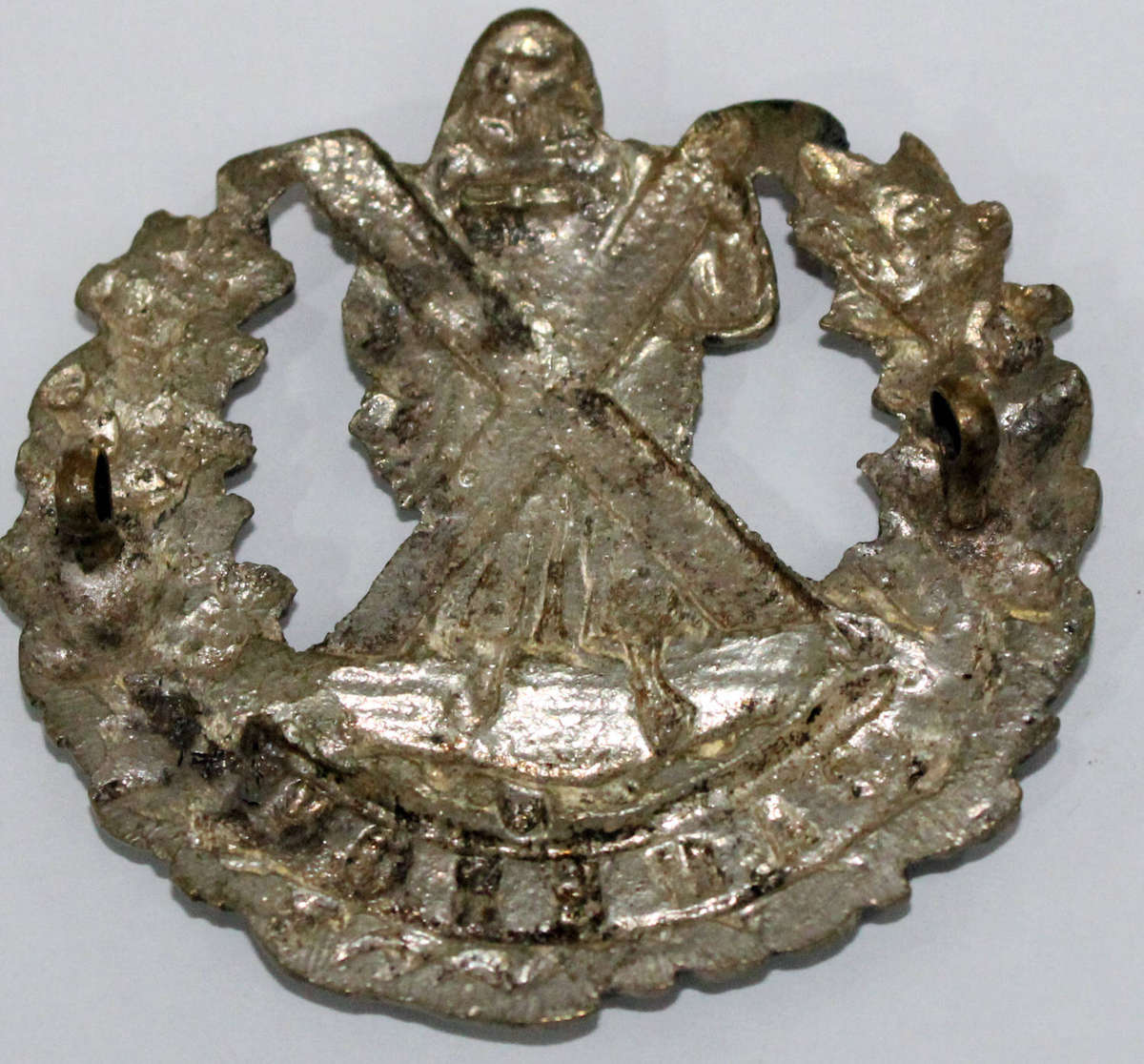 Cameron Highlanders cast cap badge