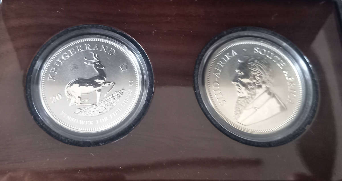 2 X 2017 1oz FINE SILVER KRUGER RANDS IN WALLNUT SAM BOX. PREMIUM UNCIRCULATED