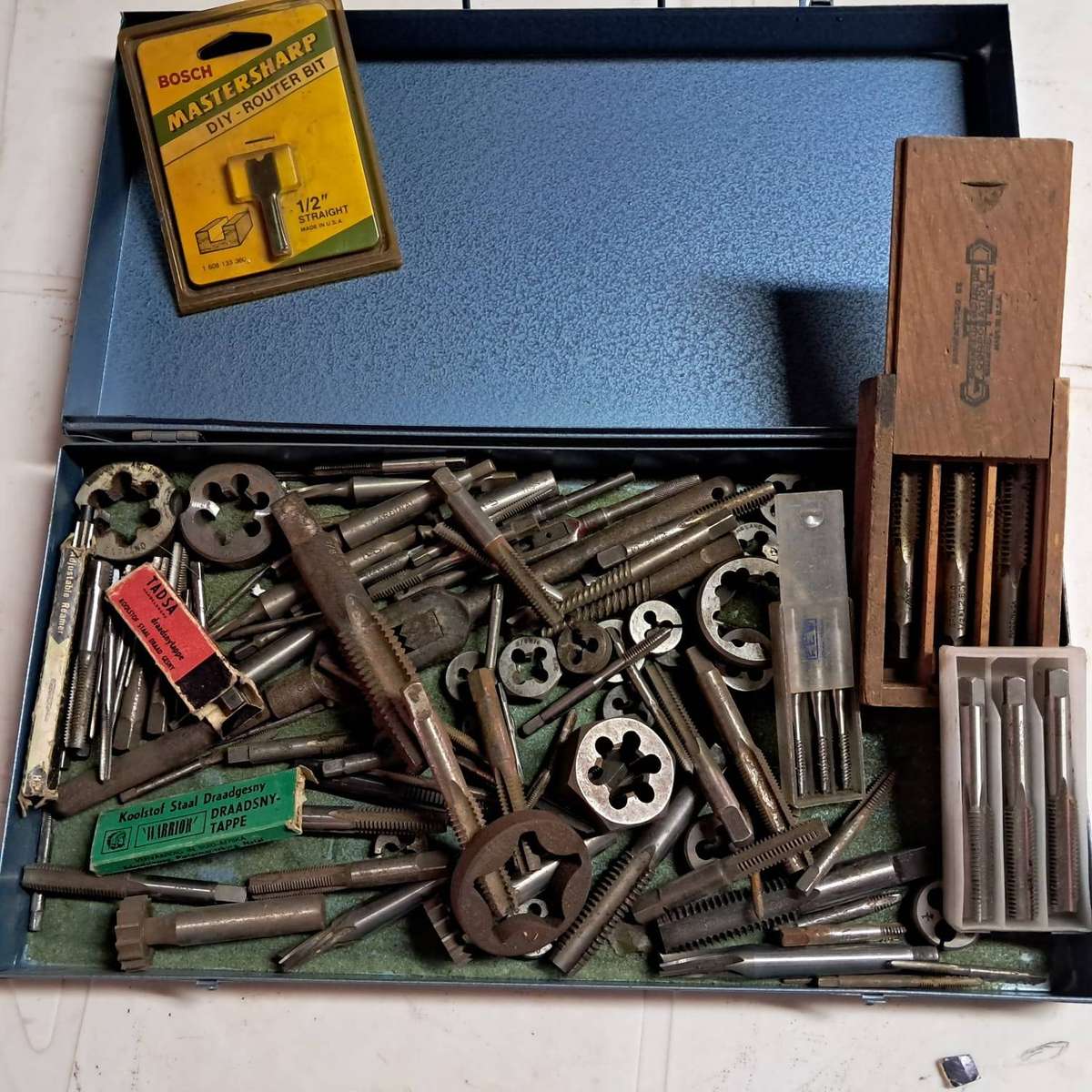 BOX FULL OF USED AND NEW TAPS, DIAS and TAP WRENCH HANDLE