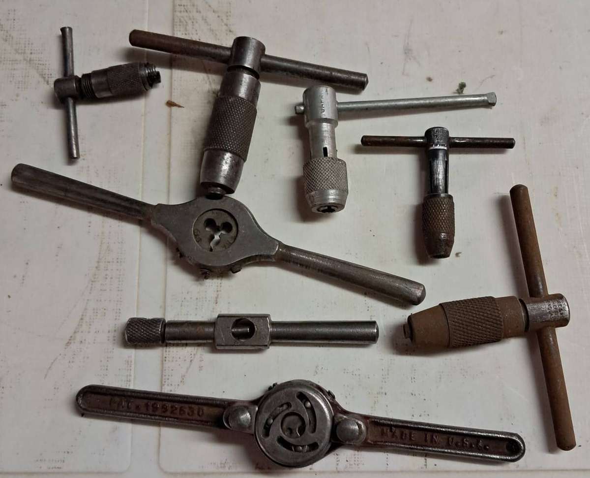 BOX FULL OF USED AND NEW TAPS, DIAS and TAP WRENCH HANDLE