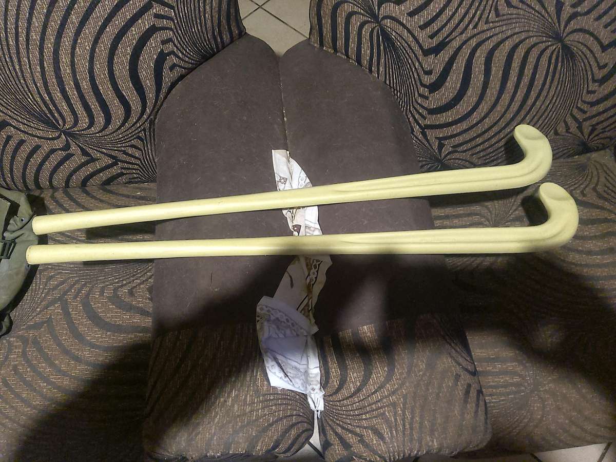 TWO HOCKEY STICKS