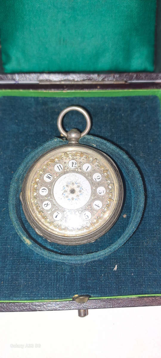 Silver pocket watch in original case