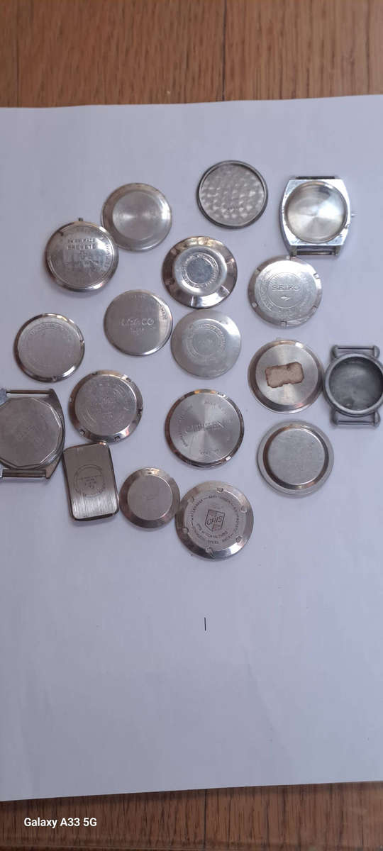 Assorted vintage men's watch case backs seiko, oris, lanco citizen etc